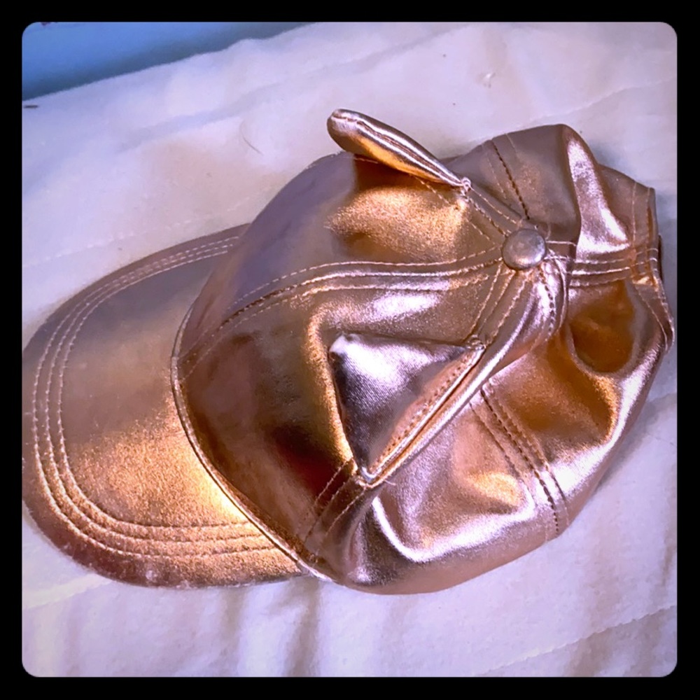 Rose gold justice hat . Been used about 3 times.